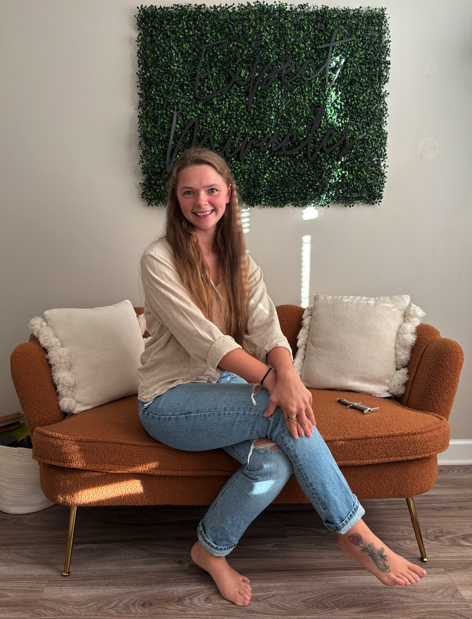 Dr. Shannon Bramlett smiling in her Travelers Rest chiropractic office